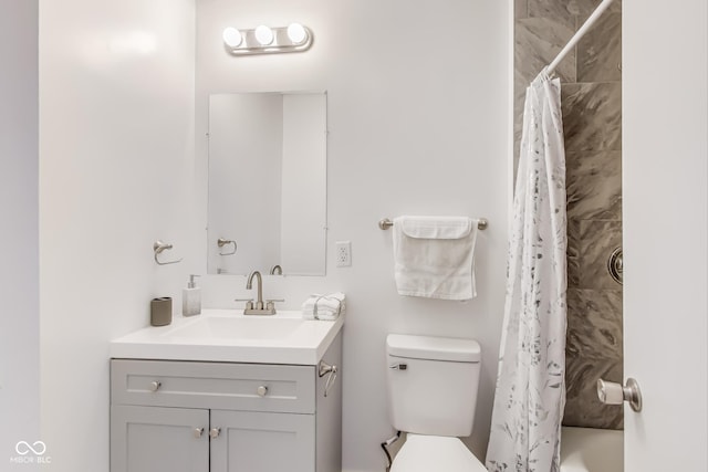 full bathroom featuring toilet and vanity