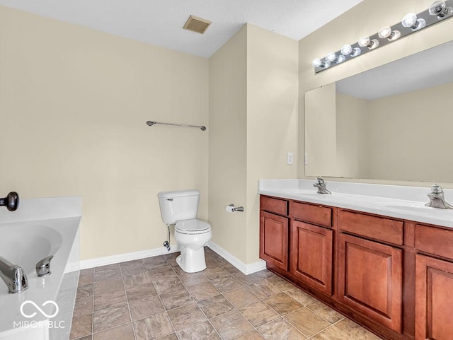 bathroom with a garden tub, toilet, a sink, visible vents, and double vanity