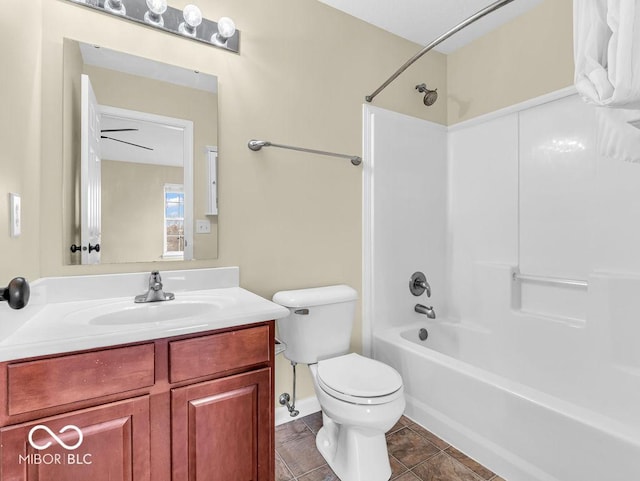 full bathroom featuring toilet, tile patterned floors, shower / washtub combination, and vanity