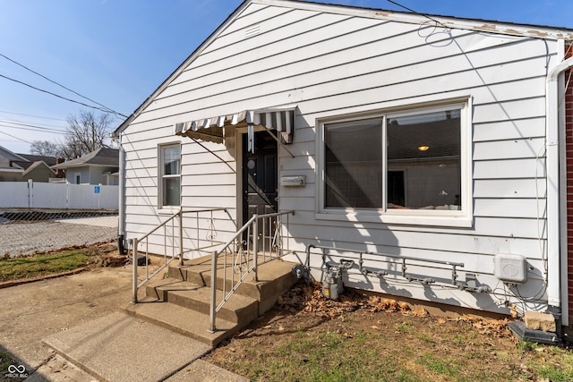 view of front of house with fence