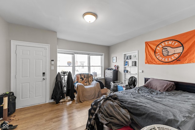 bedroom with light wood-style floors