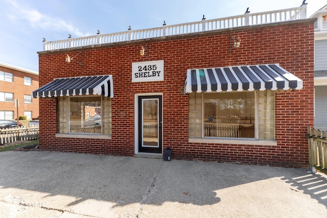 view of front of property with brick siding