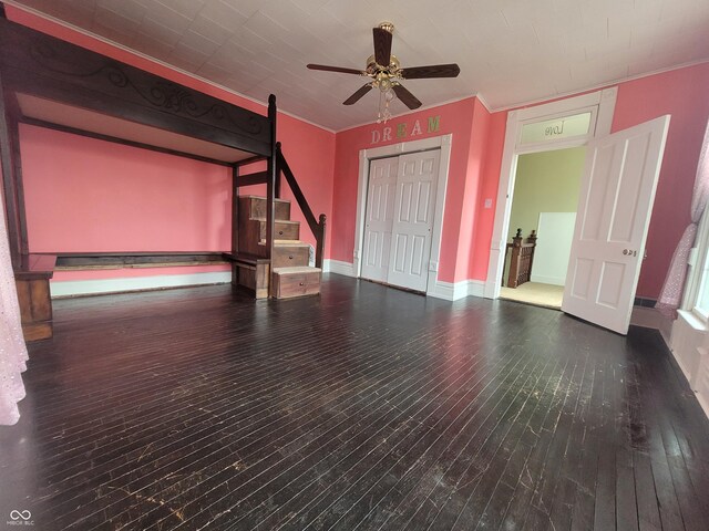 608 E Main St, Crawfordsville, IN 47933 - interior space featuring baseboards, ceiling fan, wood finished floors, crown molding, and a closet
