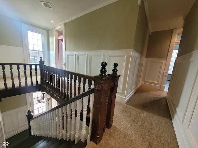608 E Main St, Crawfordsville, IN 47933 - corridor featuring wainscoting, carpet, visible vents, and an upstairs landing