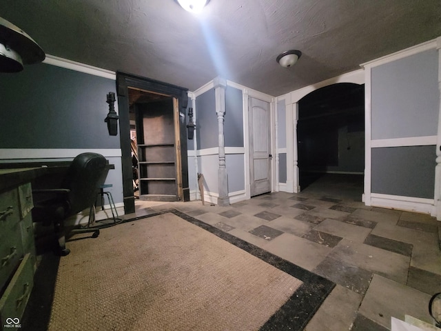 608 E Main St, Crawfordsville, IN 47933 - interior space with arched walkways, a decorative wall, and wainscoting