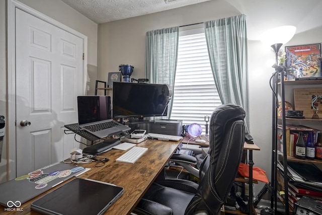 office with a textured ceiling