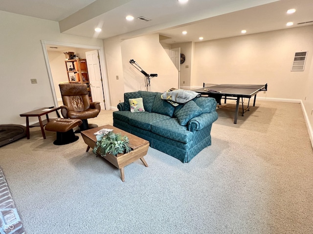 living room featuring light carpet, baseboards, visible vents, and recessed lighting