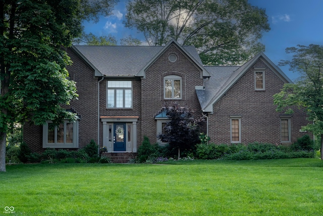 895 Baywood Ct, Columbus, IN 47201 - view of front of house featuring brick siding and a front lawn