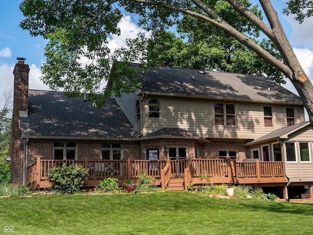 895 Baywood Ct, Columbus, IN 47201 - back of house featuring brick siding, a deck, and a yard