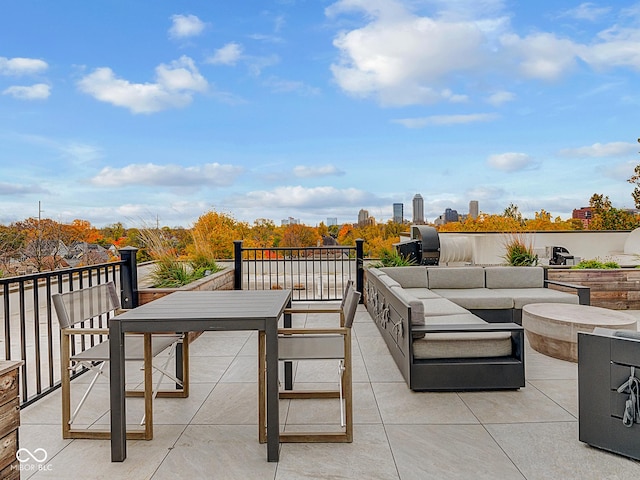 view of patio with an outdoor hangout area and a view of city