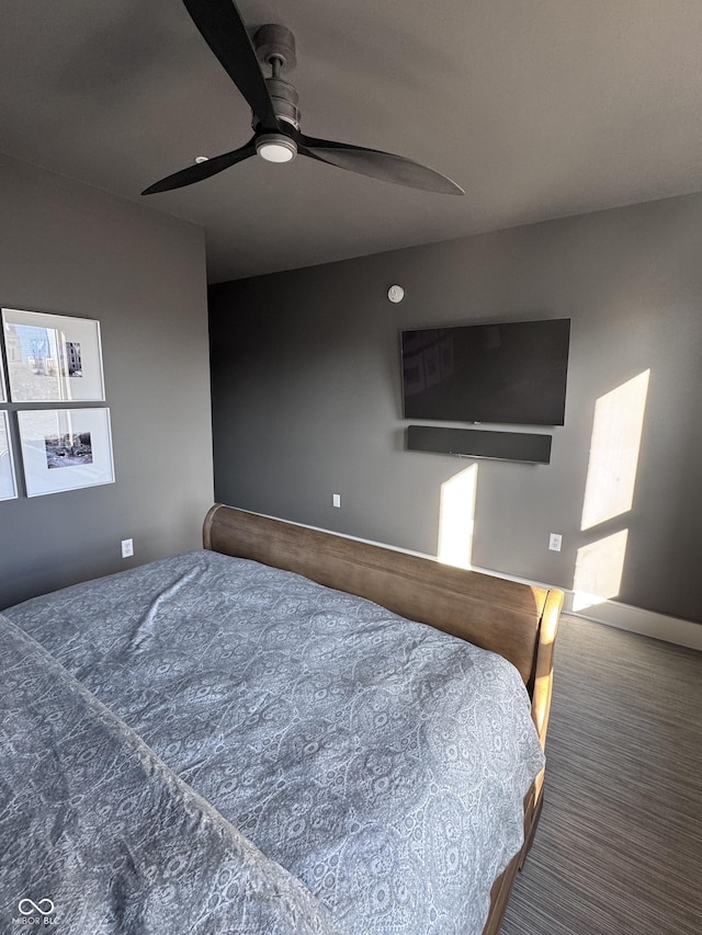 bedroom featuring carpet and a ceiling fan