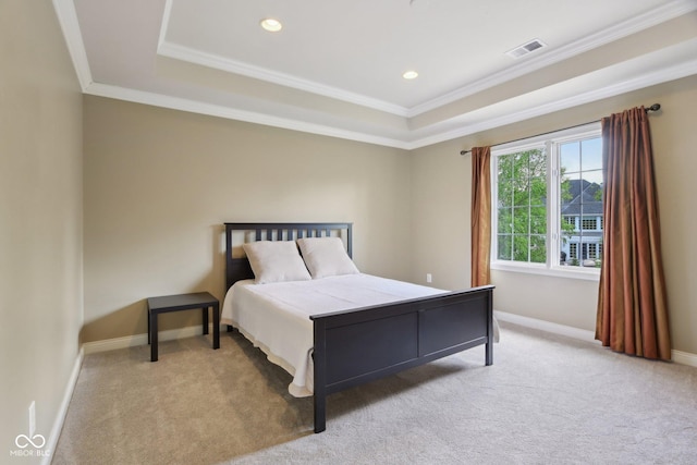 carpeted bedroom with ornamental molding, a raised ceiling, recessed lighting, and baseboards