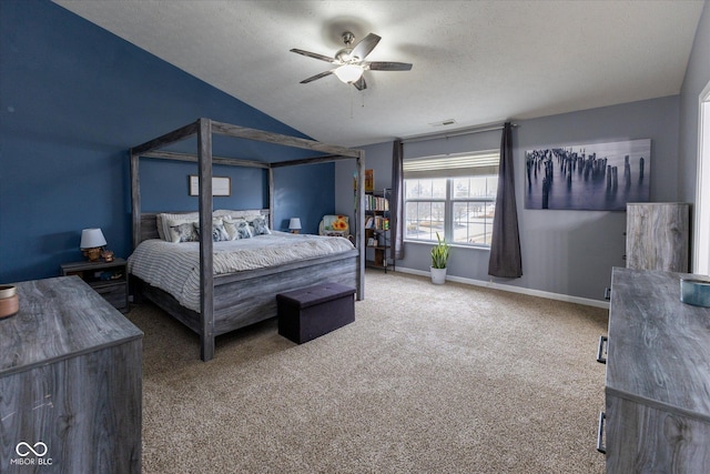 bedroom featuring lofted ceiling, a textured ceiling, carpet floors, visible vents, and baseboards