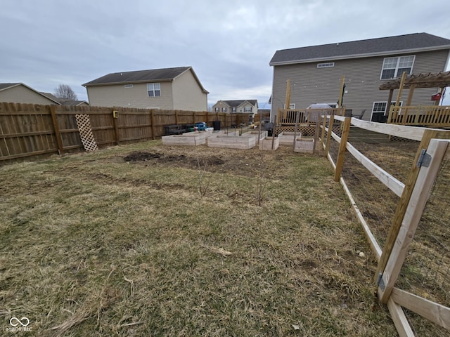 view of yard with a patio area, a fenced backyard, and a pergola