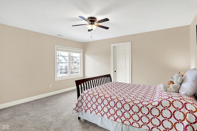 bedroom with ceiling fan, carpet, visible vents, and baseboards