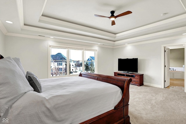 bedroom with light carpet, ornamental molding, a tray ceiling, recessed lighting, and baseboards