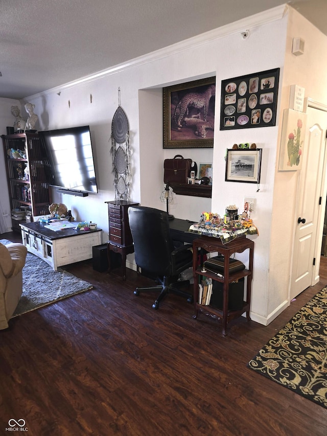 office featuring a textured ceiling, ornamental molding, and wood finished floors