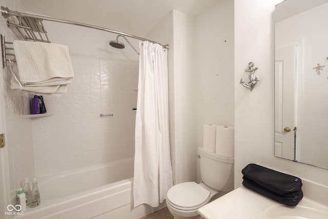 full bathroom featuring shower / tub combo, vanity, and toilet