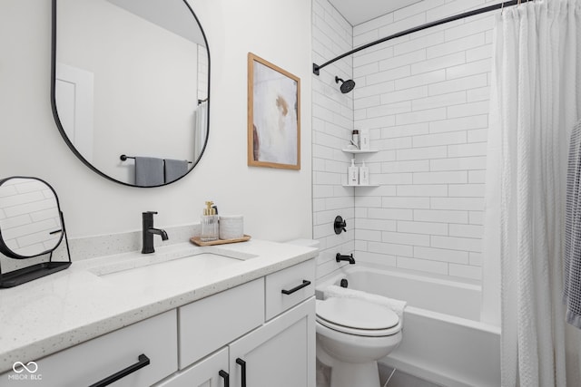 bathroom with vanity, toilet, and shower / bath combo with shower curtain