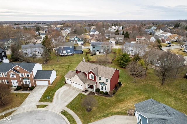 birds eye view of property with a residential view