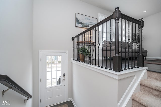 stairway featuring recessed lighting and baseboards