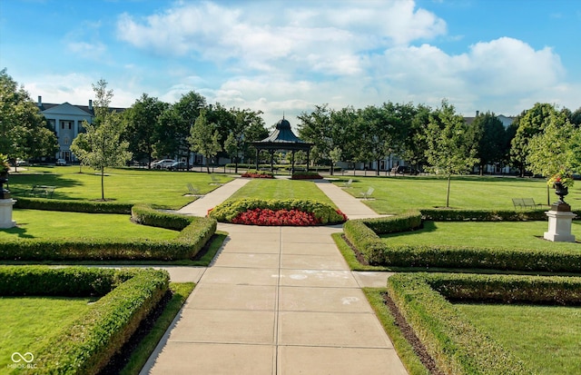 view of community featuring a gazebo and a yard