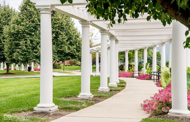 surrounding community featuring a yard