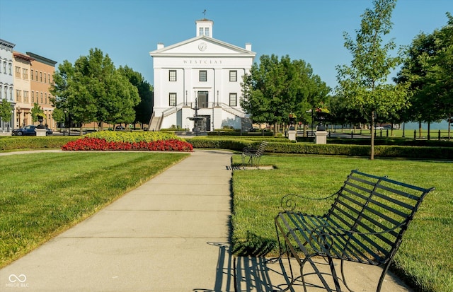 surrounding community with a lawn