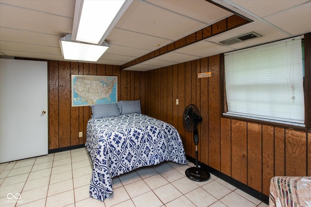 1612 Westbay Ct, Indianapolis, IN 46260 - bedroom with wooden walls and light tile patterned floors