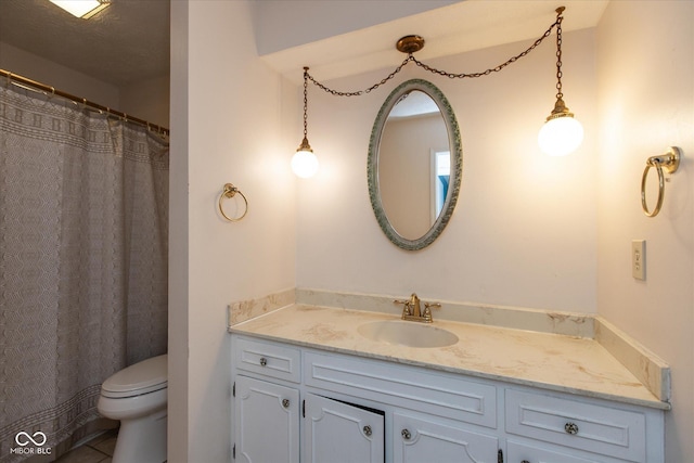 1612 Westbay Ct, Indianapolis, IN 46260 - full bath featuring toilet, vanity, and tile patterned floors