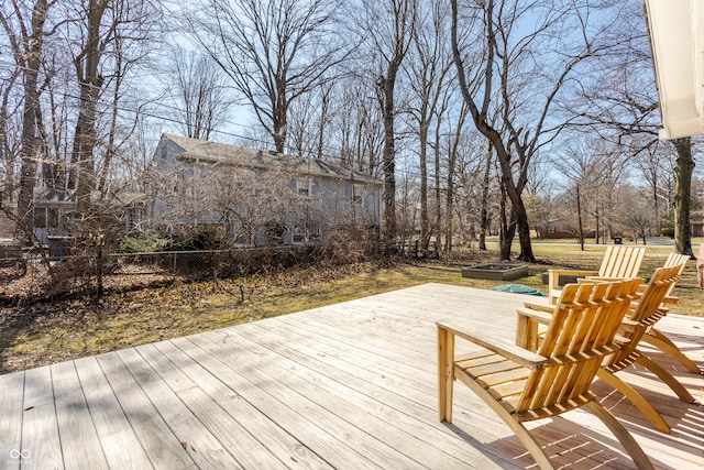 wooden deck featuring fence