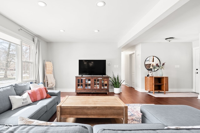 living room with recessed lighting, wood finished floors, and baseboards