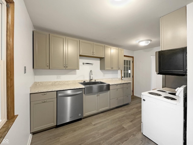 kitchen featuring a sink, white electric range, gray cabinets, and stainless steel dishwasher