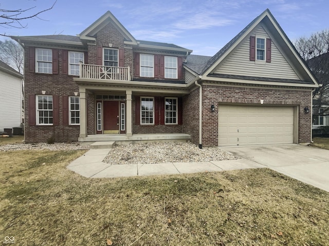 view of front of house with brick siding, a porch, a balcony, a garage, and driveway