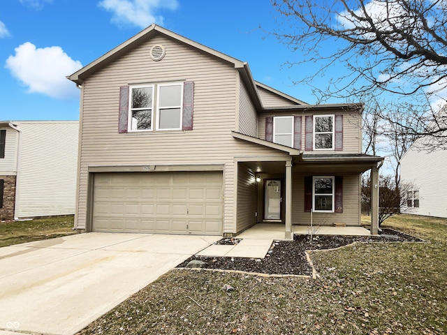 traditional home with a garage, covered porch, and concrete driveway