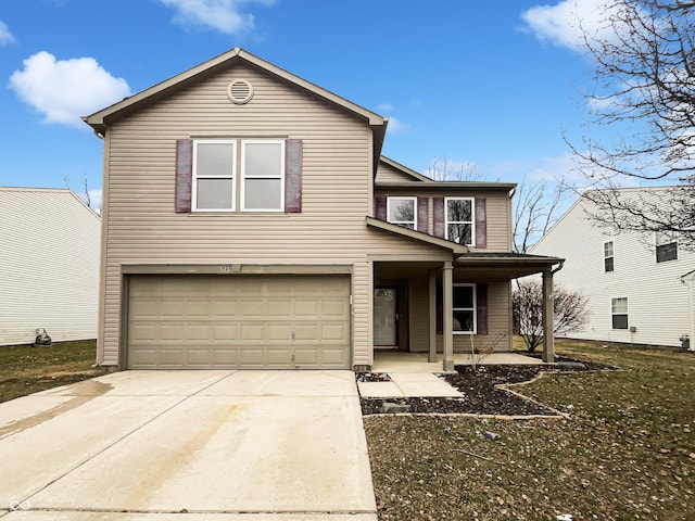 traditional home featuring driveway, a porch, and an attached garage