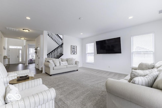 4078 Omaha Dr, Bargersville, IN 46106 - carpeted living room featuring stairs, recessed lighting, visible vents, and baseboards