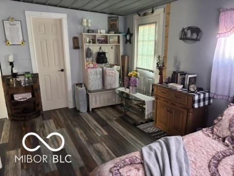 bedroom with wood finished floors