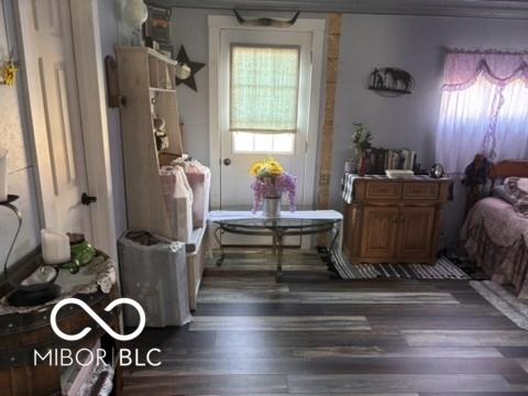 bedroom featuring wood finished floors