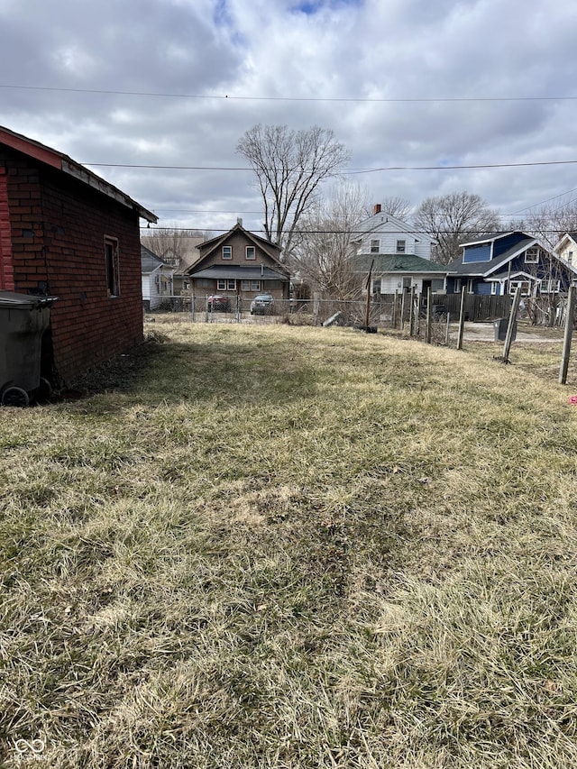 view of yard featuring fence