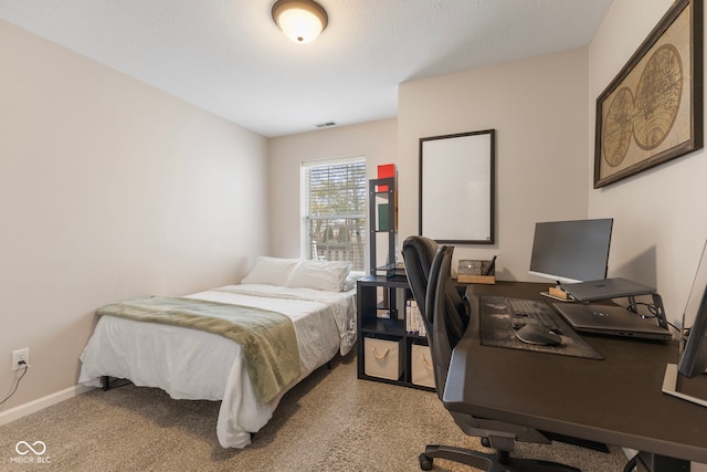 bedroom with visible vents and baseboards