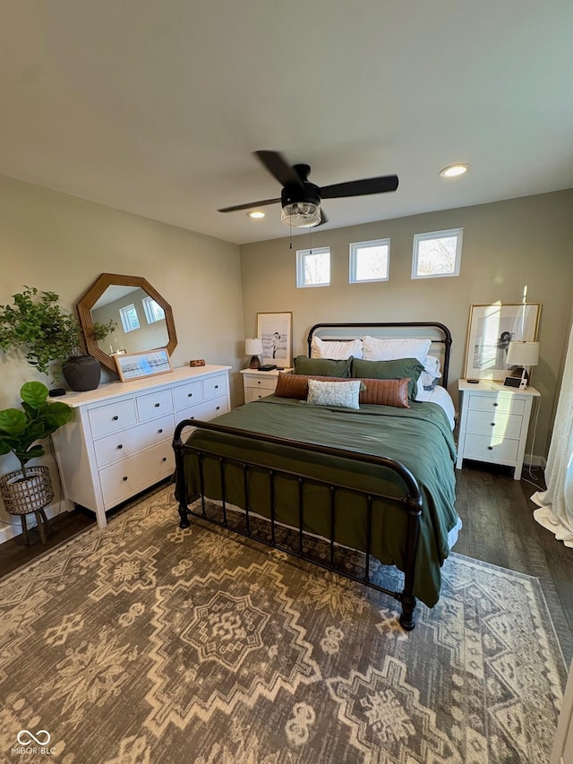 bedroom with ceiling fan, wood finished floors, and recessed lighting