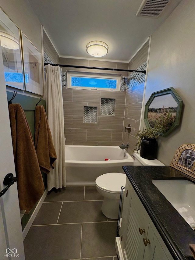 full bath with toilet, tile patterned floors, vanity, visible vents, and shower / tub combo with curtain