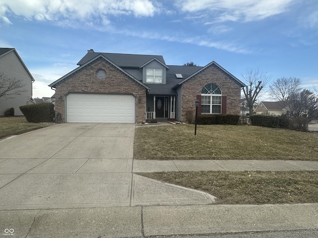 traditional-style home featuring an attached garage, concrete driveway, brick siding, and a front yard