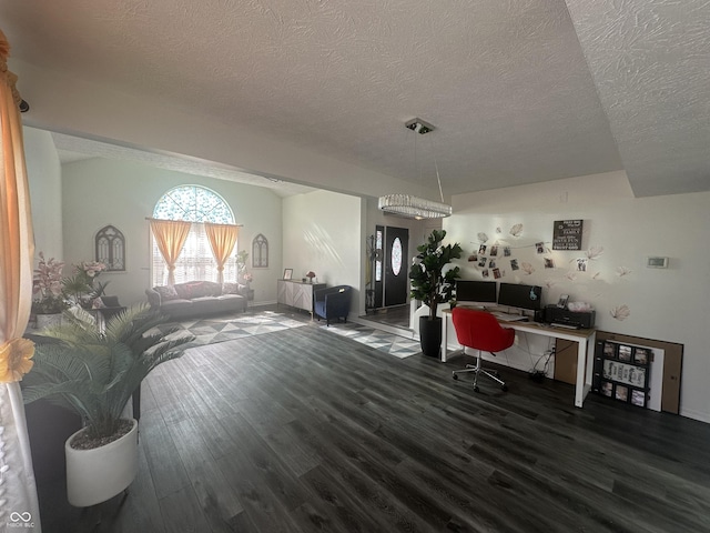 office space with a textured ceiling and wood finished floors