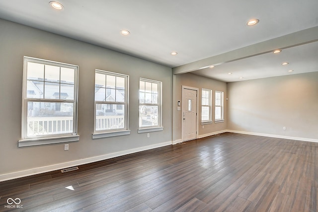 2308 Nowland Ave, Indianapolis, IN 46201 - spare room featuring dark wood-style floors, baseboards, visible vents, and recessed lighting
