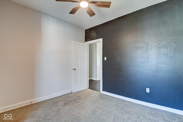 2308 Nowland Ave, Indianapolis, IN 46201 - empty room featuring carpet, a ceiling fan, and baseboards