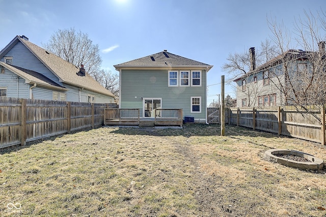 2308 Nowland Ave, Indianapolis, IN 46201 - rear view of property with a yard, a fenced backyard, and a wooden deck