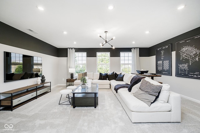 living area with baseboards, recessed lighting, visible vents, and light colored carpet