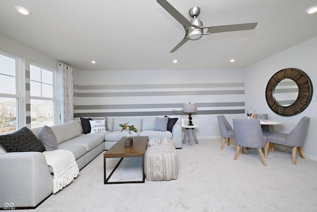 living room featuring a ceiling fan, carpet, baseboards, and recessed lighting